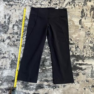Lululemon size 6 black capri pants with slit in back